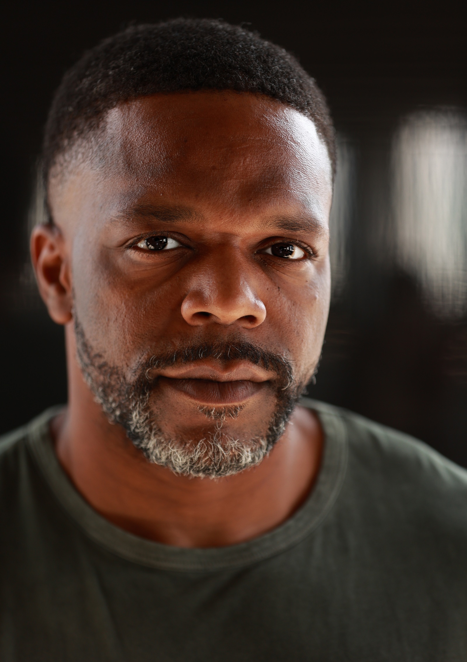 Theatrical headshot of Frank David Monroe, professionally known as Khing Jus Wurk